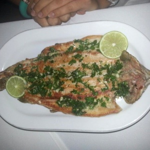 Trucha al ajillo