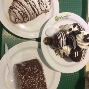 cola de langosta, profiterol y brazo gitano de chocolate