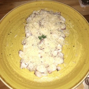 Tiradito de pulpo a la parmesana